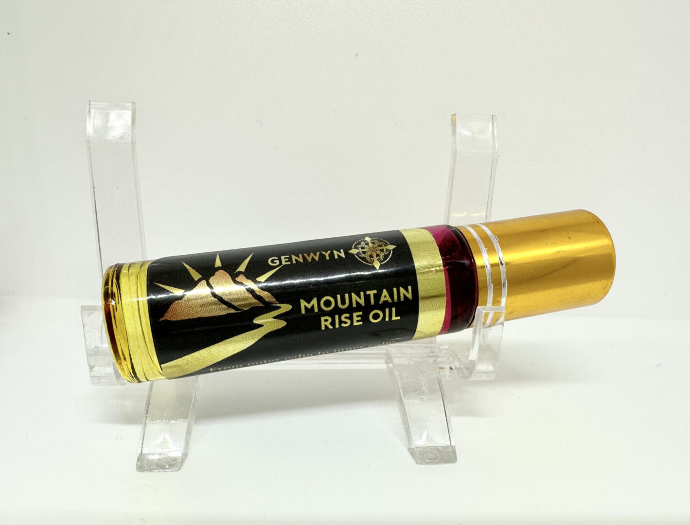 A bottle of mountain rise oil on display.