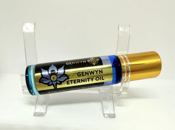 A gold tube of gengwyn eternity oil on top of a stand.